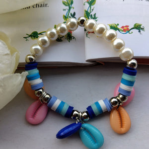 Cowrie Pearl Charm